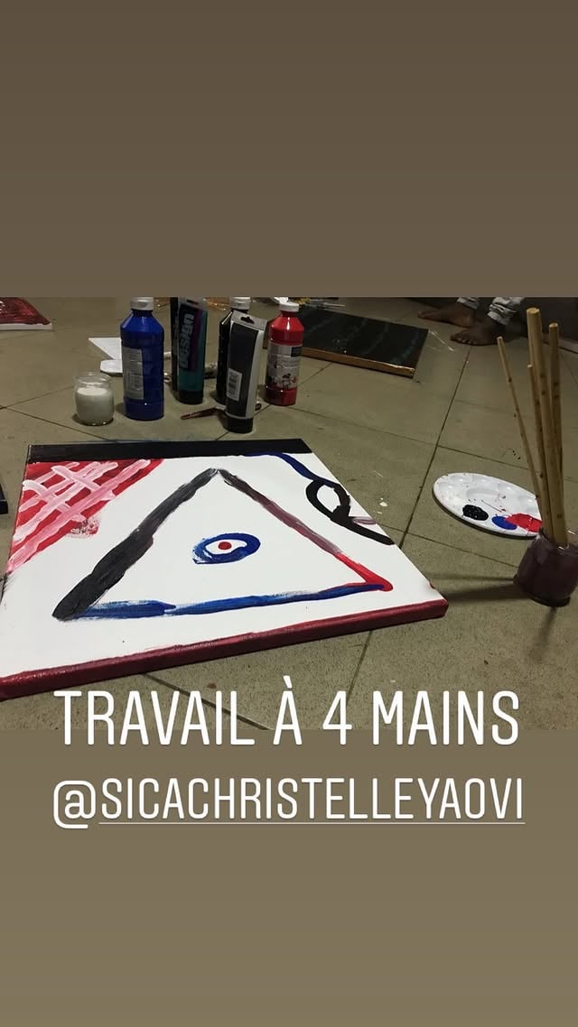 Close-up of a studio microphone with warm amber lighting